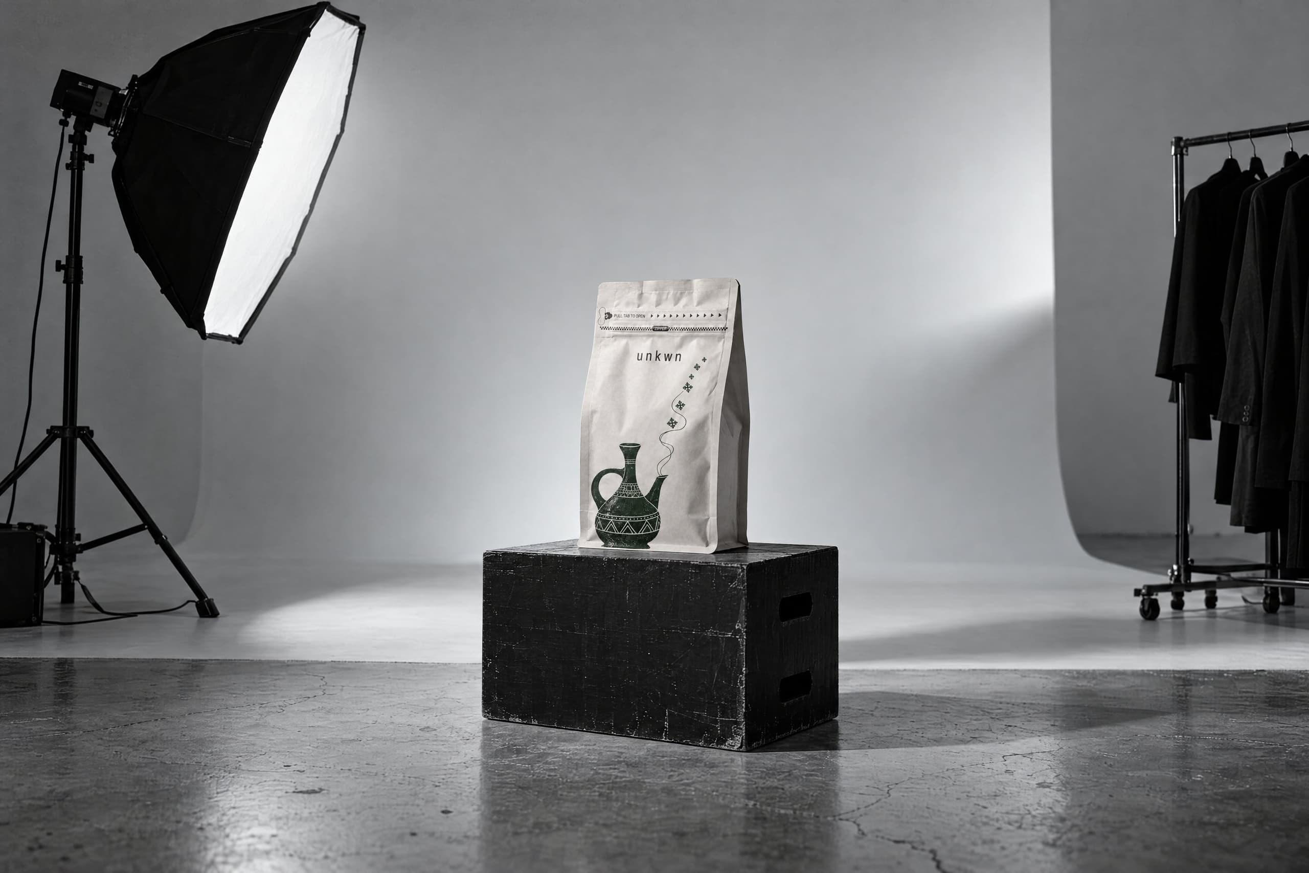 Empty studio: cyclorama, softbox, an unkwn bag on an apple box